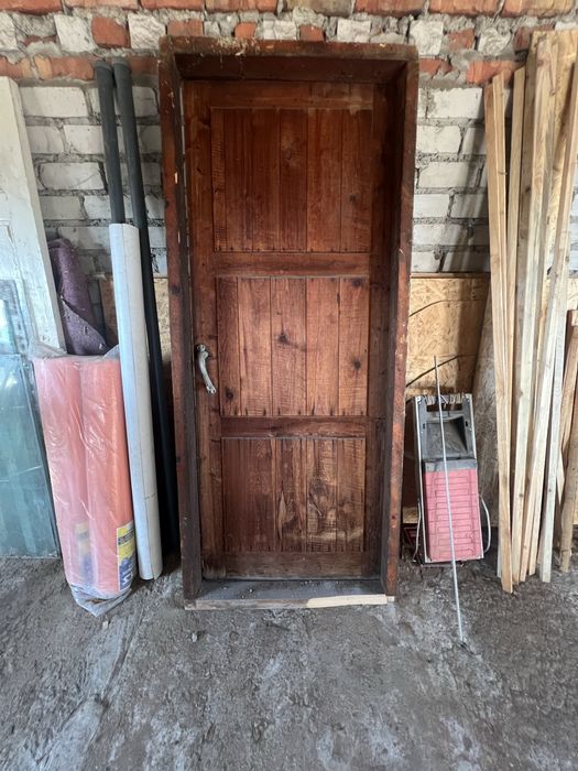 Двері деревяні з облудою.