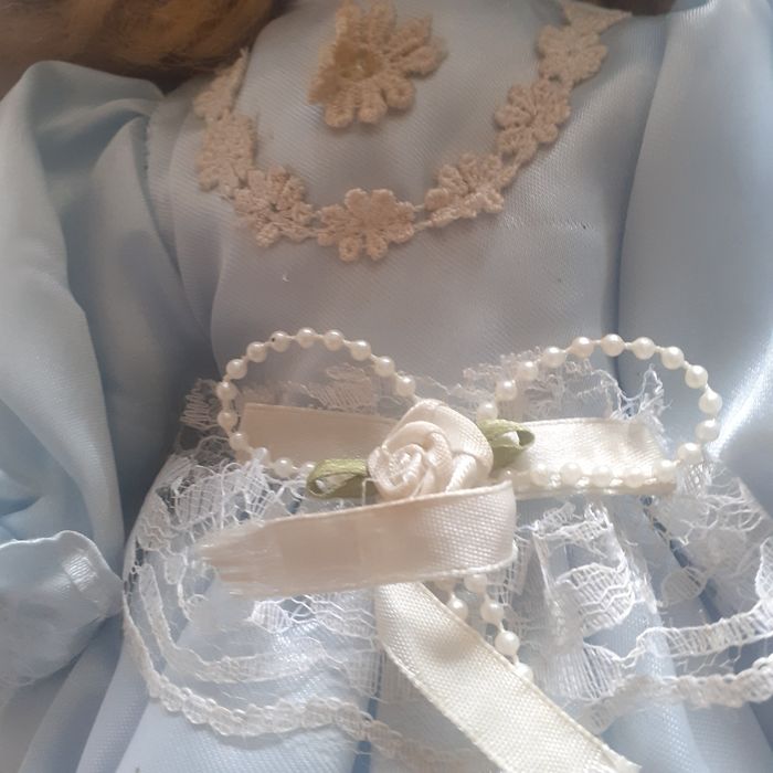 3 bonecas de porcelana