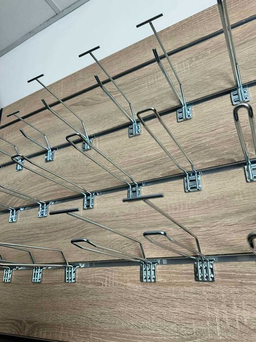 Торгові стелажі в магазин. Гачки. Каси. Полки. Торгове обладнання