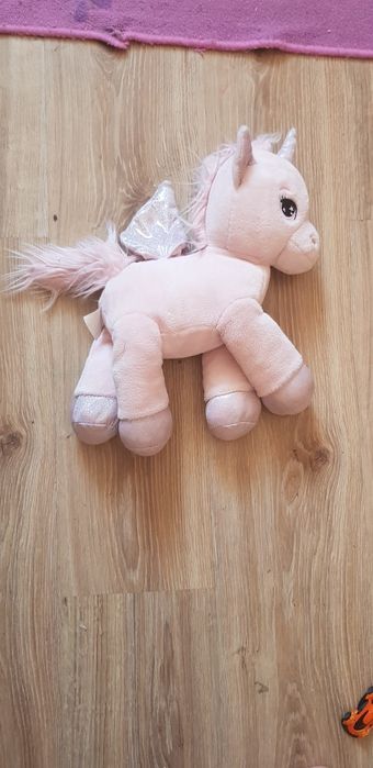 Śliczny brokatowy konik