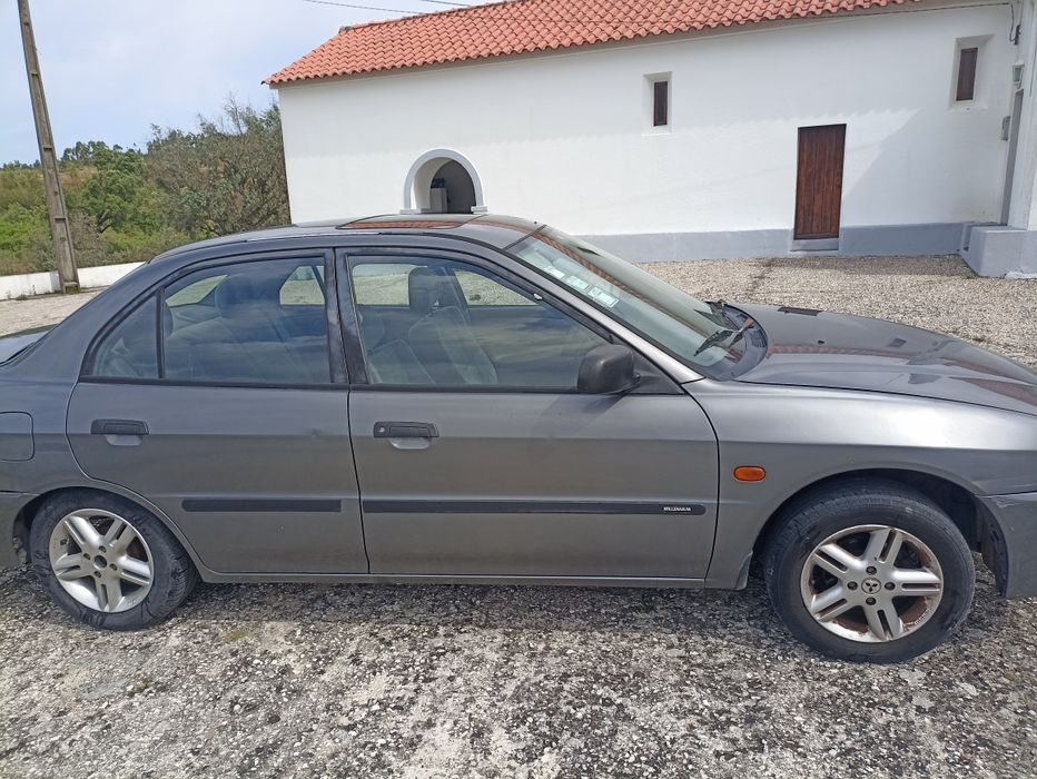 Mitsubishi Lancer 1.3 glx a andar com inspeção chumbada