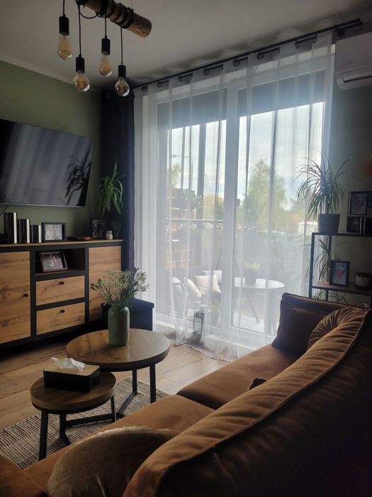 Przestronne mieszkanie z ogrodem i dwoma miejscami parkingowymi