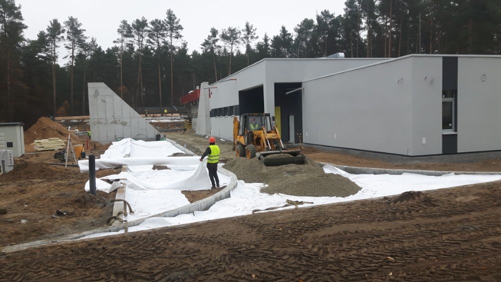 Brukarstwo przemysłowe układanie maszynowe układarka  leveller system