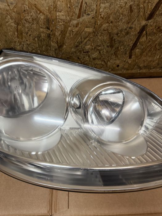Передні фари Hella Volkswagen Golf 5 Jetta 03-09 ціна за штуку