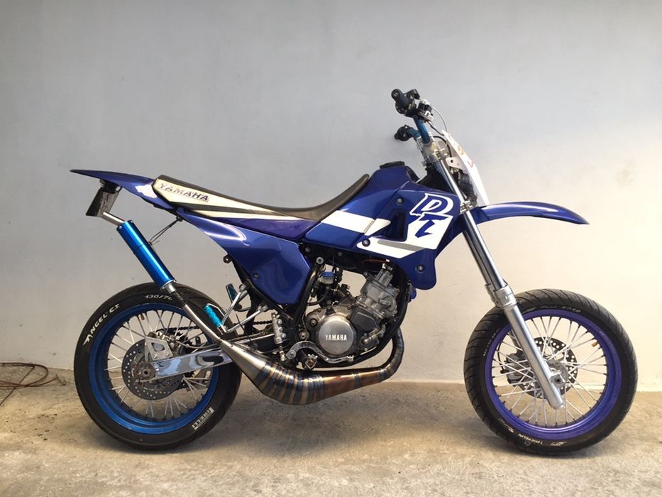 Escape artesanal  dtr 125