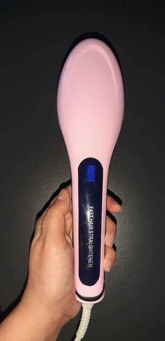 Гребінець-вирівнювач для волосся