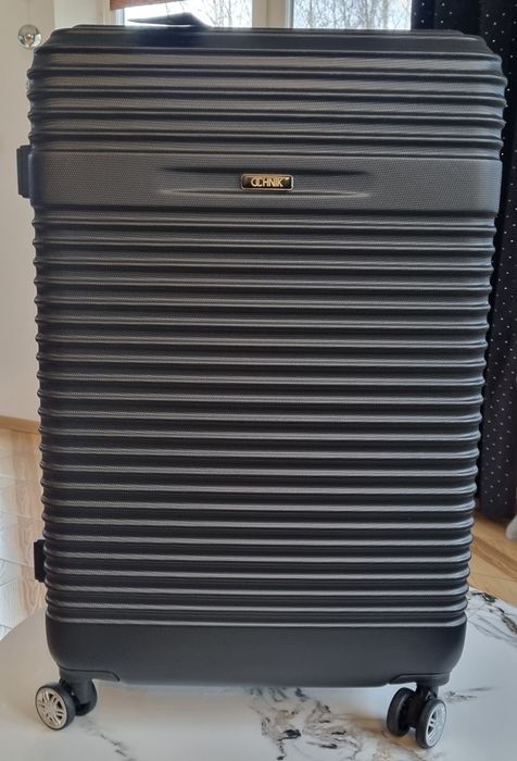 Ochnik komplet nowych czarnych walizek na kółkach