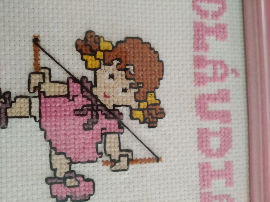 Quadro de criança, com nome.