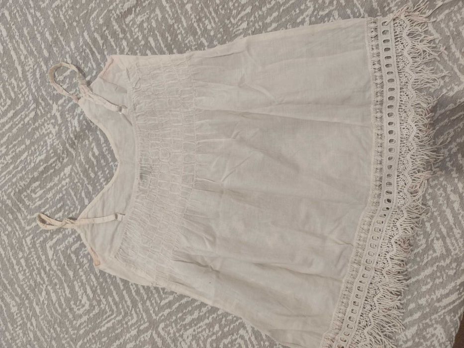 Top branco com franjas