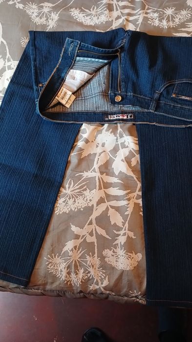 Продам джинсы 52 размера