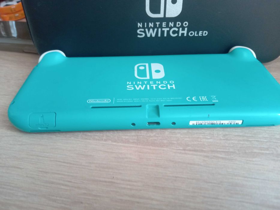 Нинтендо свич лайт + аксесуари + картридж 23 фіфа + акаунт 20+ игор