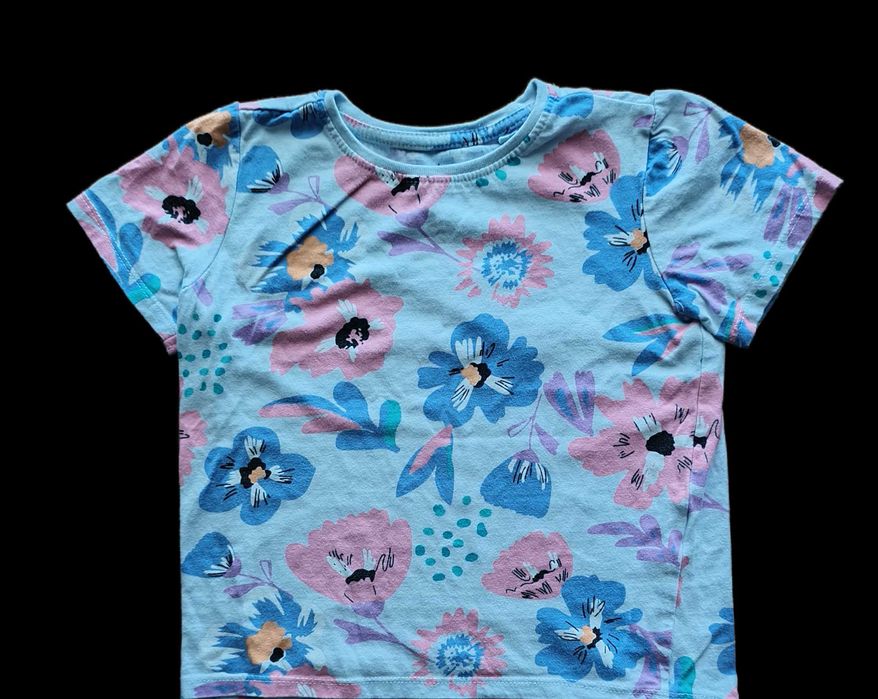 DZIEWCZYNKA -niebieska bluzeczka w kwiatki rozm-110/116cm