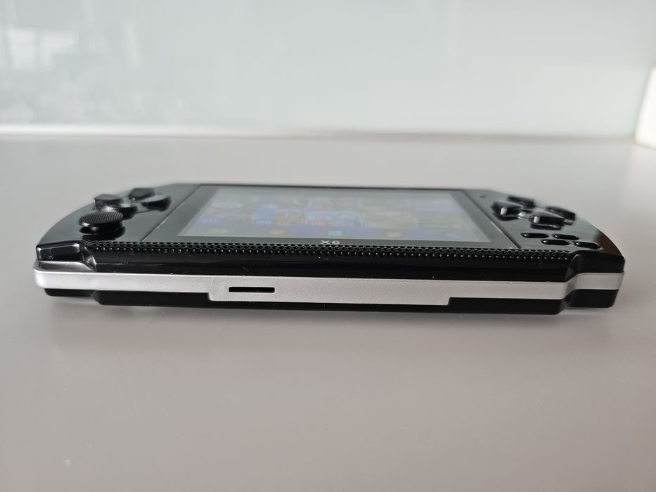 Consola de jogos portátil com bolsa