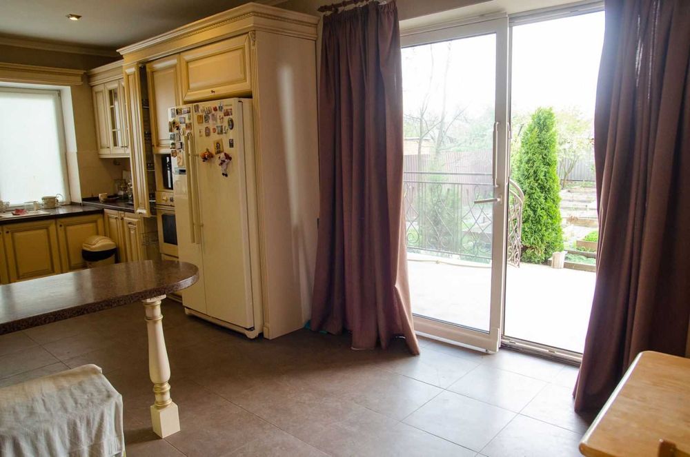 Будинок  з гаражем в м.Охтирка