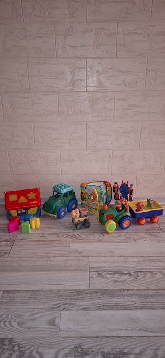 Лот іграшок сортер будинок машинки трактор