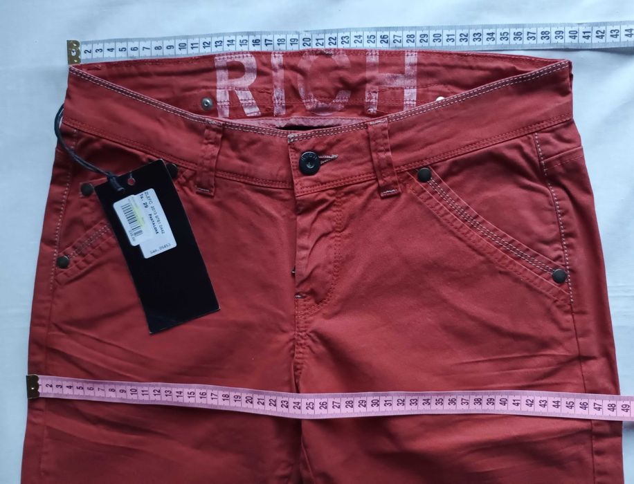 Жіночі джинси клеш Jonh Richmond. 29, 30 розмііри. Made in Italy.