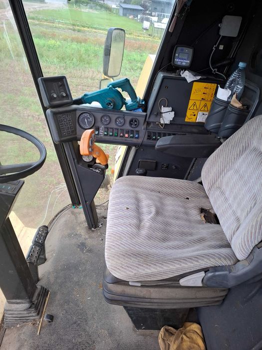 Kombajn New Holland TC56