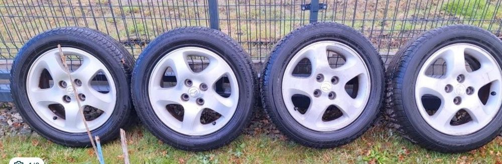 Oryginalne Alufelgi 15" cali Mazda 323F BJ 2001r.
