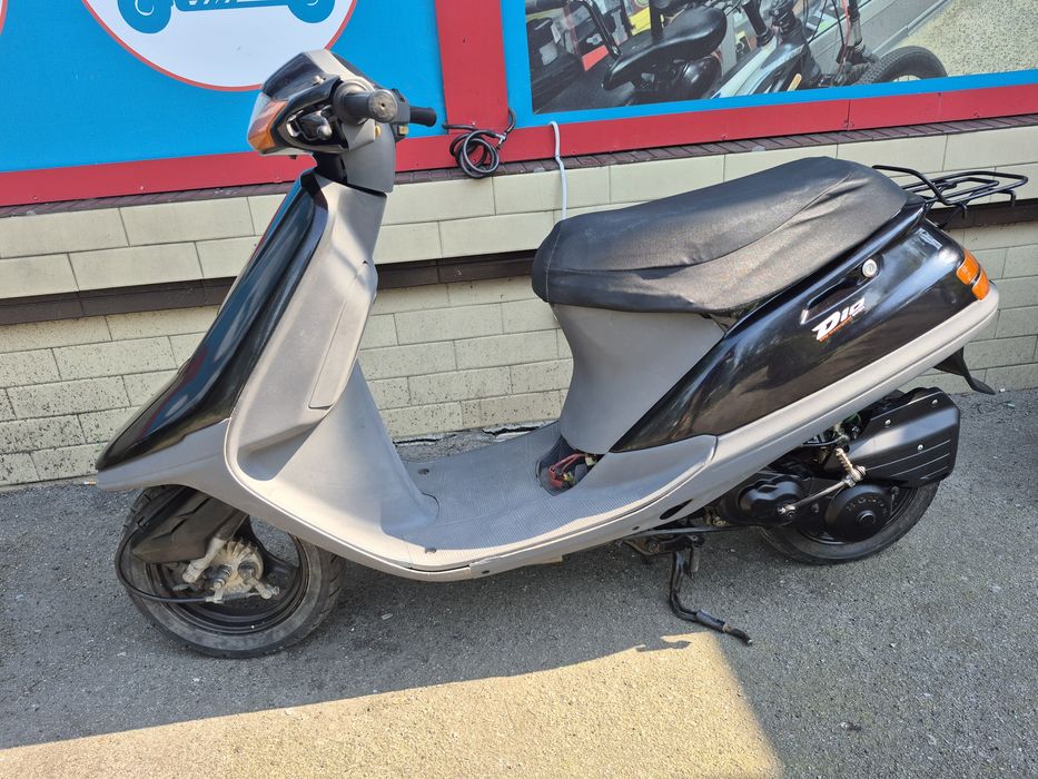 Скутер Honda Tact.