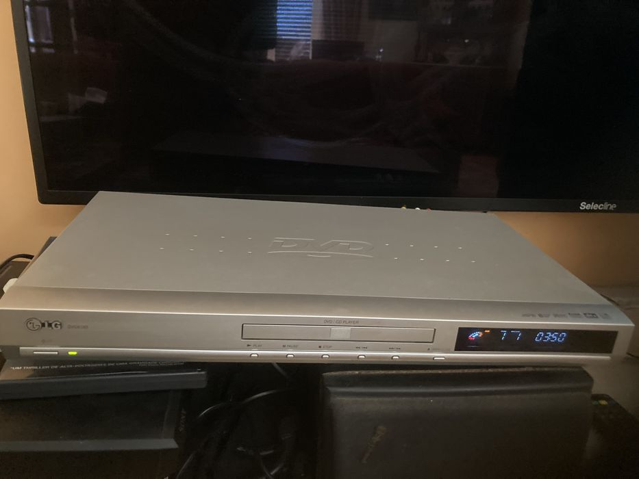 DVD marca LG como novo dentro da caixa