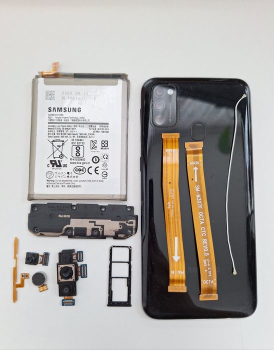 Запчастини до телефону Samsung M21