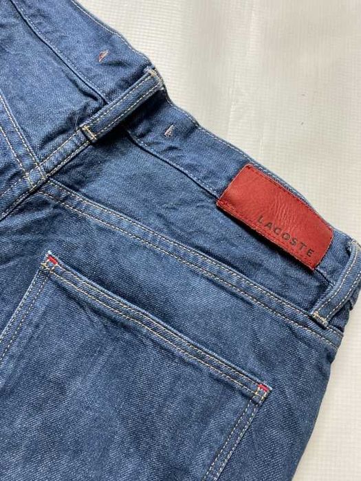 Lacoste LIVE oryginalne niebieskie męskie Spodnie Jeansy W 32 L 32
