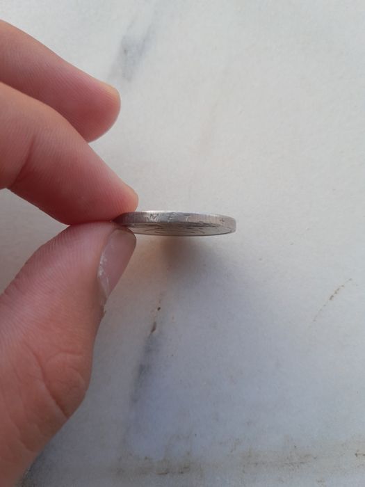 Moeda de 2€ dos Países Baixos, de 2001, com o perfil da Rainha Beatrix