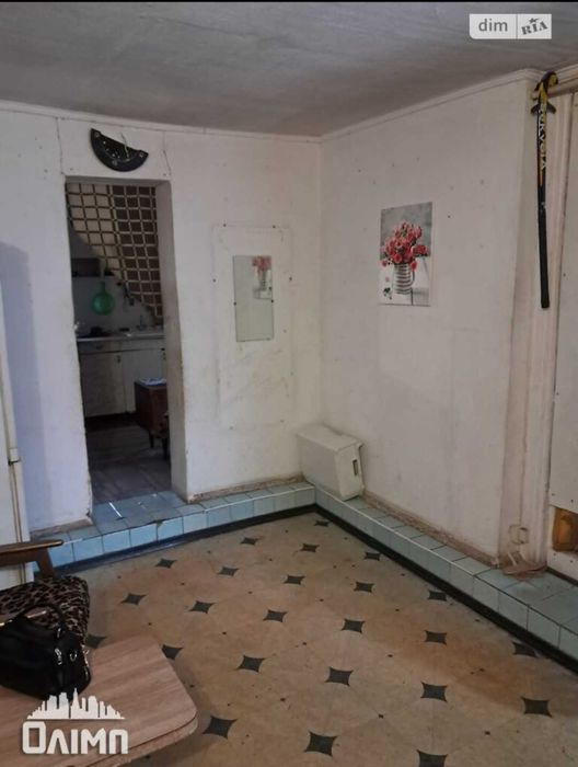 Продам пів будинку в топовом місці на вул.Кармелюка 0962