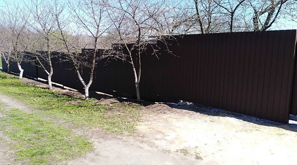 Ворота та паркани з профнастилу