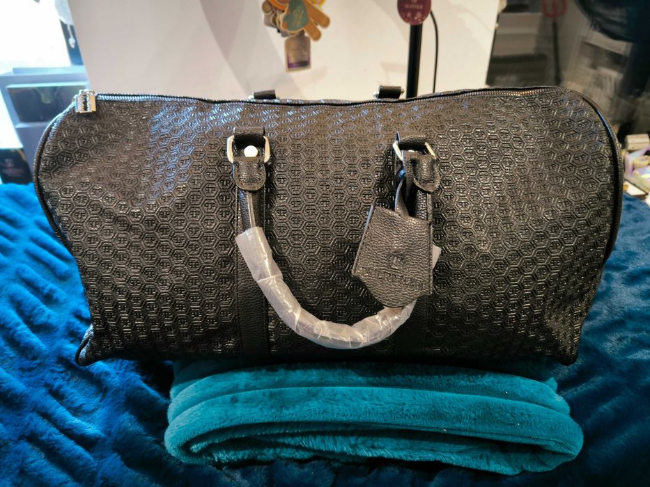 Torba podróżna torebka podręczna różne firmy i modele.