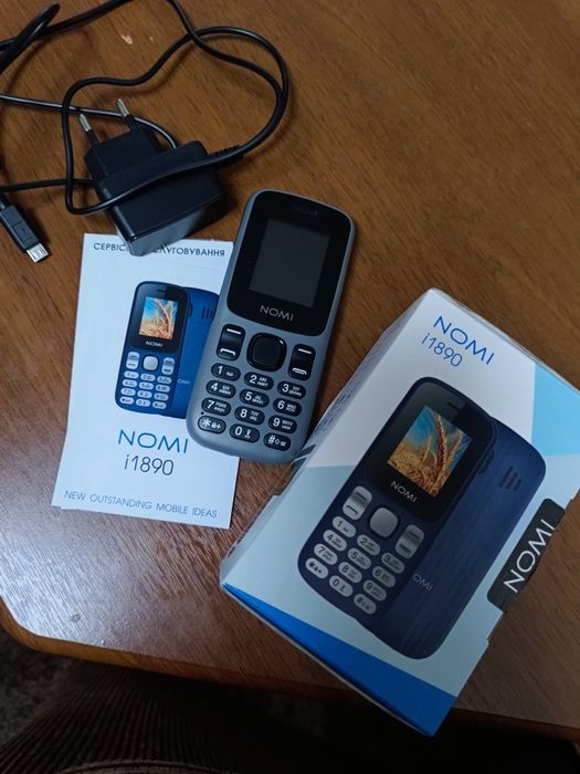 Продам новый телефон Nomi i1890,