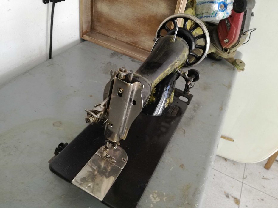 Cabeças de máquinas de costura Singer