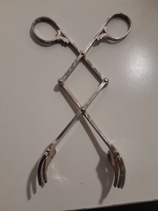 Pinça de gelo ' banho de prata.