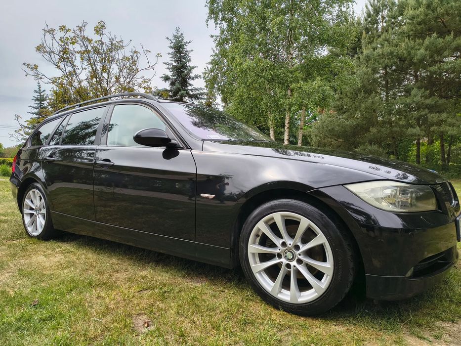BMW Seria 3 BMW E 91 320d 200KM black sapphire