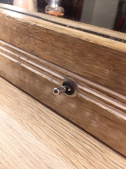 Espelho com luz de camarim