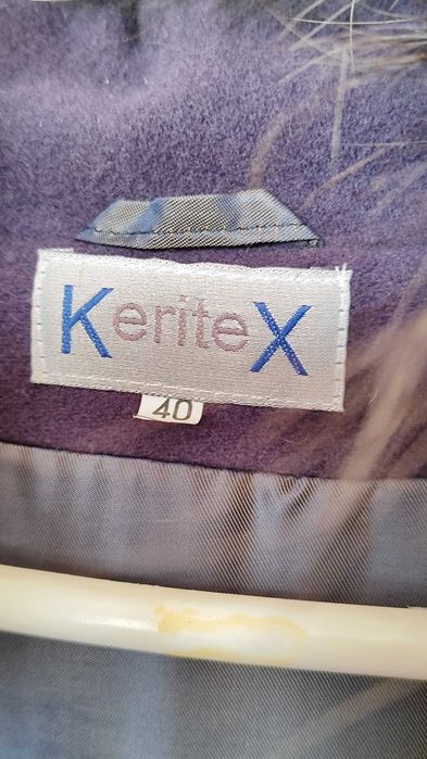 Płaszcz zimowy z futrem z jenota 40