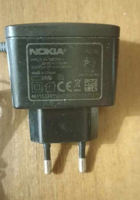 Продам зарядное устройство для телефона Nokia AC-3E оригинал, тонкий штекер 2,0 мм