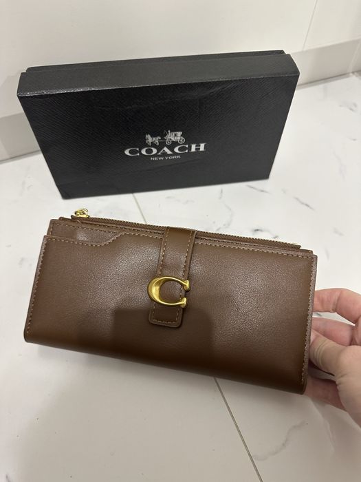 Duzy brazowy pojemny portfel coach