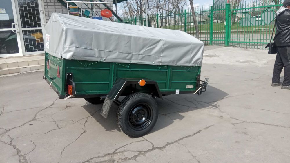 НОВИЙ УНІВЕРСАЛЬНИЙ ПРИЦЕП с завода 2000/1300/410  Доставка. Гарантія.