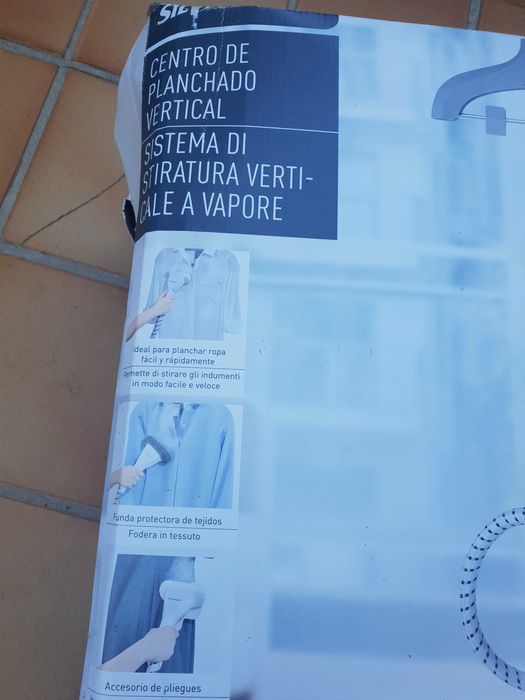 Maquina de engomar a vapor.64285416439297123