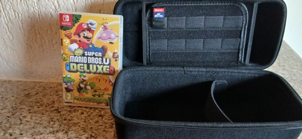 Nintendo switch 2 ,bolsa de viagem, 2 jogos,2 comandos