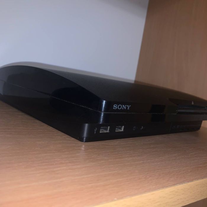 PlayStation 3 Slim 320 GB + геймпади + ігри
