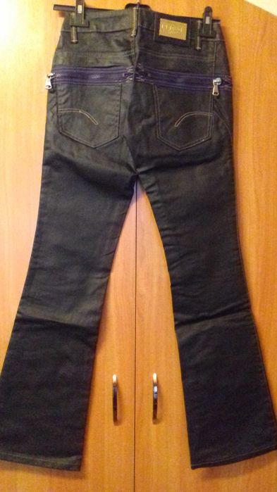 Spodnie z rozszerzaną nogawką dzwony a'la skóra woskowane Redial