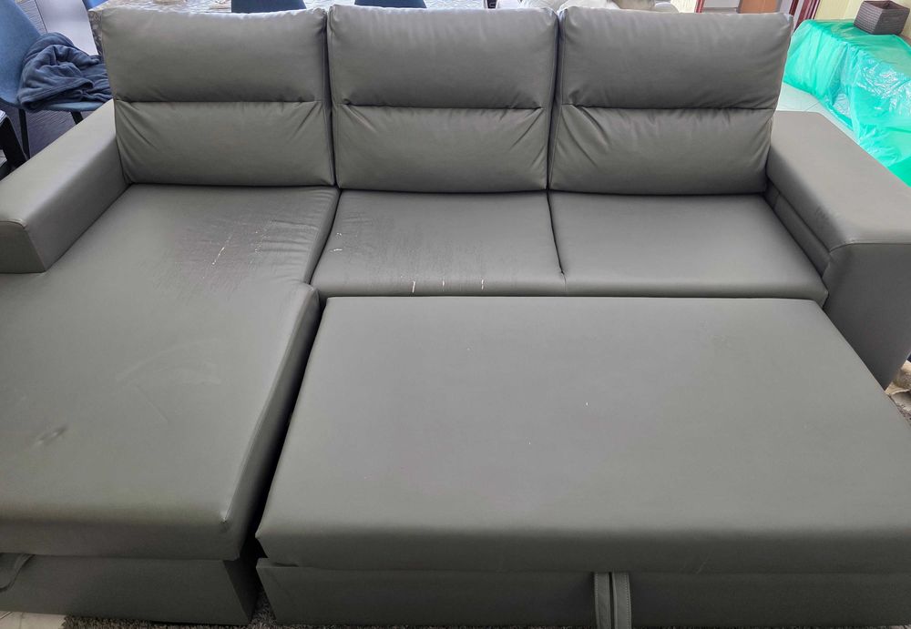 Sofá de canto em L com chaise longue e sofá-cama