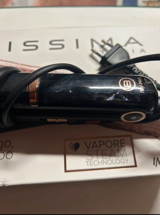 Prancha de cabelo a vapor