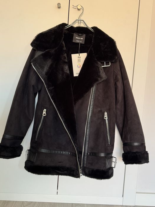 Casaco P&B preto com etiqueta