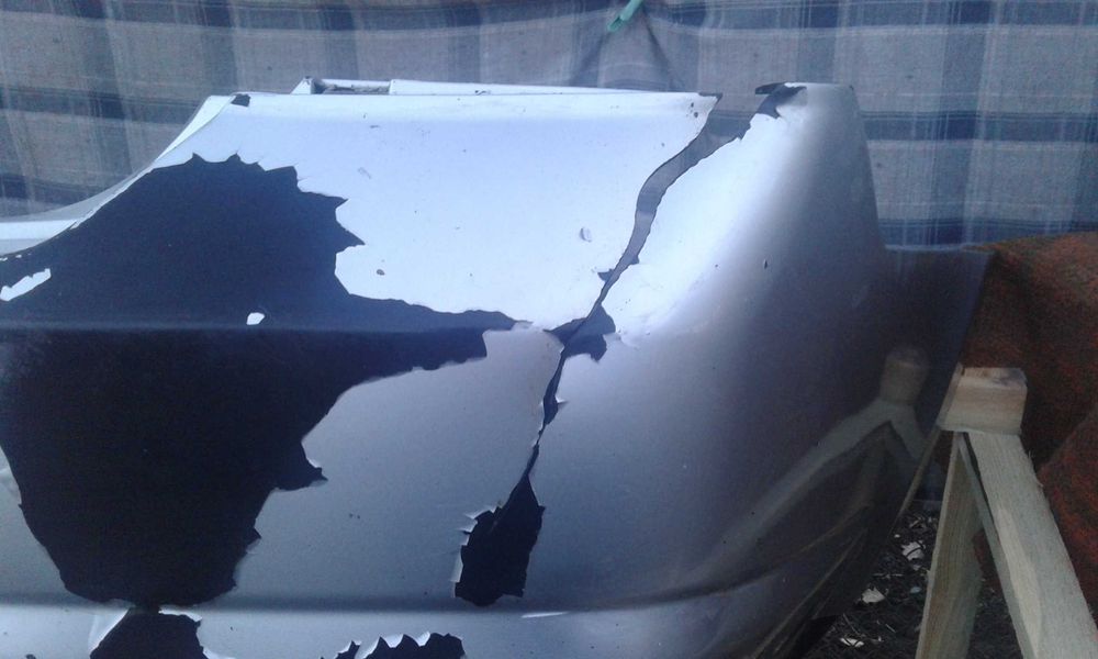 Бампер задний NISSAN Tiida