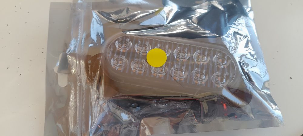 Vendo 2 faróis  luz laranja led fixa