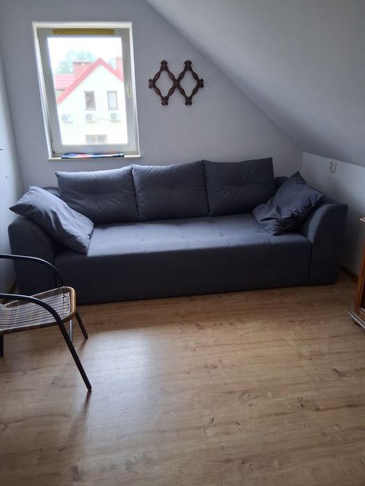 Sofa rozkładana, duża, pojemnik na pościel, poduszki w komplecie