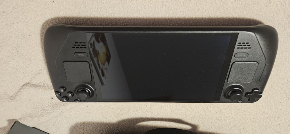 Steam deck OLED 512GB + 512GB Karta micro sd, stacja dokująca. Jak nówka!